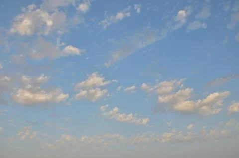 Colored clouds at sunset Stock Photos