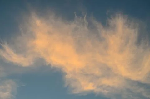 Colored clouds at sunset Photos