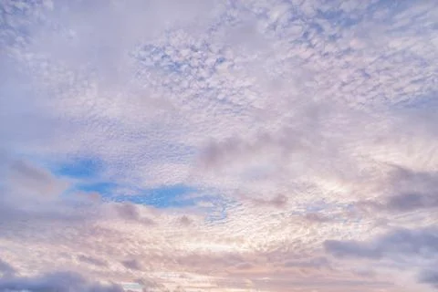 Colored cloudy sky at sunset Stock-Fotos