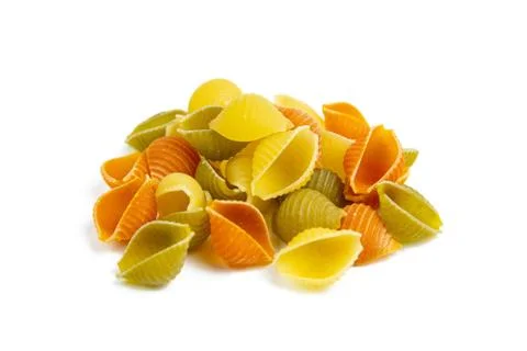 Colored conchiglie shell pasta isolated on white background Stock Photos