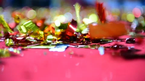 Colored confetti on the ground after celebration event 動画素材 64793933