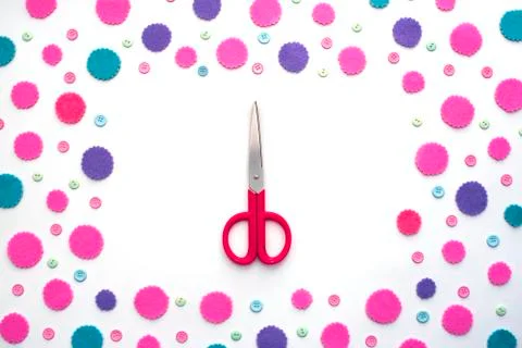 Colored confetti on white background flat lay top view. Stock Photos