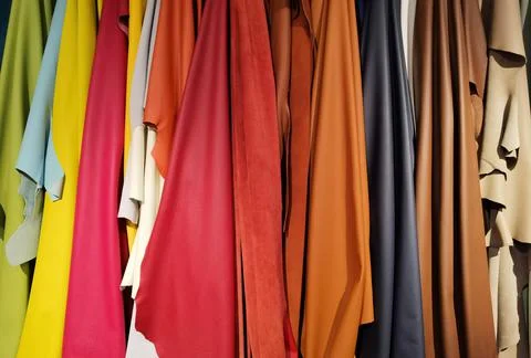 Colored cowhide leather ready for processing Stock Photos