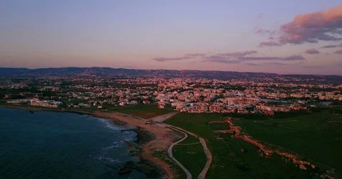 Colored cozy town at sunset over the island. Video shooted with  drone. Stock Footage 74180782