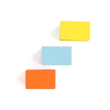 Colored craft boxes on a white background. Orange, blue, yellow. Place for .. Foto stock