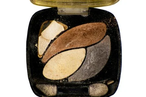 Colored crashed eyeshadow for make up isolated on white background. Close up Stock Photos