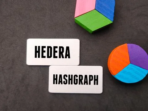 Colored cube written with text HEDERA HASHGRAPH on black background.Business  Stock Photos