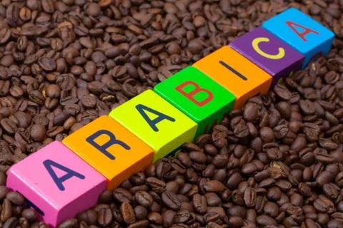 Colored  cubes and coffee beans 库存照片