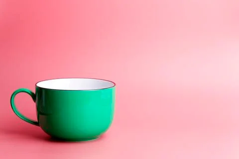 Colored cup on an empty colored background, minimal concept background. Home  Foto stock