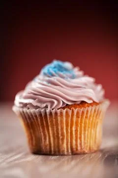 Colored Cupcake on Background. High quality photo. Stock Photos