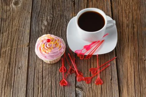 Colored cupcake on rustic background Foto stock