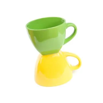 Colored cups. Isolated on white background. Stock Photos
