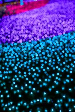 Colored decorative festive bokeh lights sparkle brightly. Stock-Fotos