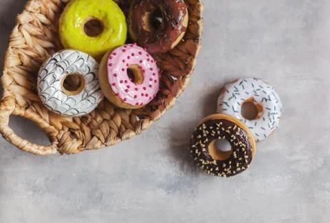 Colored different donuts with icing and topping Stock Photos