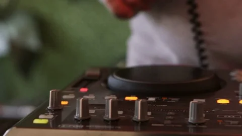 Colored discs playing in a discotheque on a DJ turntable Stock Footage 80109823