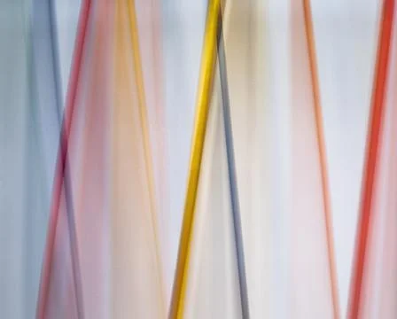 Colored Dowels In Motion Stock Photos