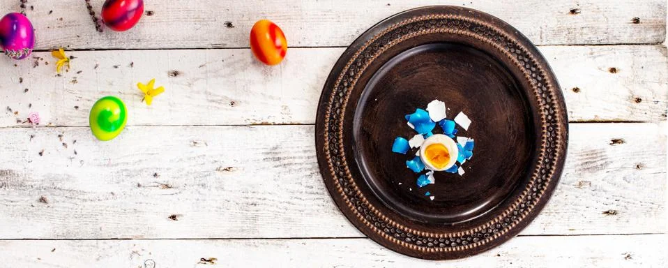 Colored easter egg on wood background 스톡 사진
