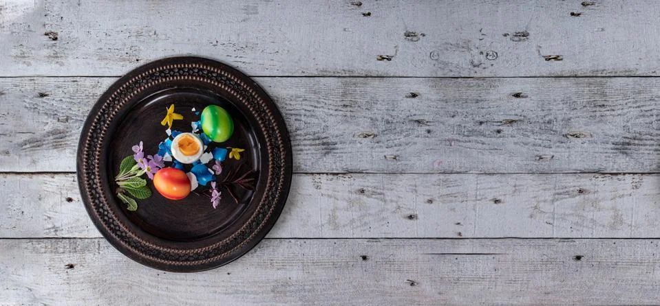 Colored easter egg on wood background Stock Photos