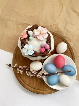 Colored easter eggs and easter cake background Stock Photos