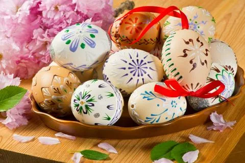 Colored Easter Eggs With Blossom On The Table Stock Photos