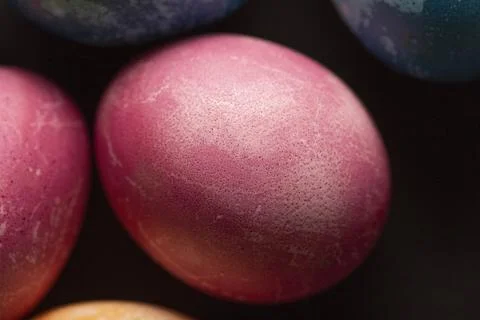 Colored Easter eggs on a dark background. 写真素材