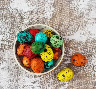 Colored easter eggs on a light canvas background,place for text Stock Photos