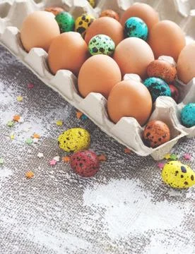 Colored easter eggs on a light canvas background,place for text Stock Photos