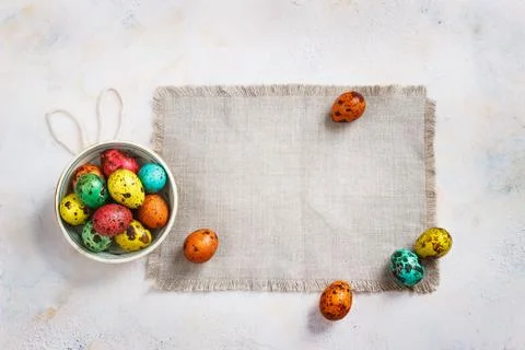 Colored easter eggs on a light canvas background,place for text Stock Photos