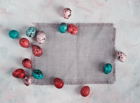 Colored easter eggs on a light canvas background,place for text Stock Photos