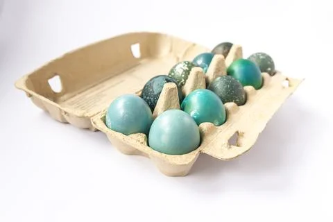Colored Easter eggs in the paper box. Stock Photos