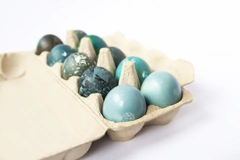 Colored Easter eggs in the paper box. Stock Photos