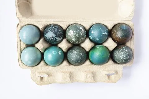 Colored Easter eggs in the paper box. Stock Photos