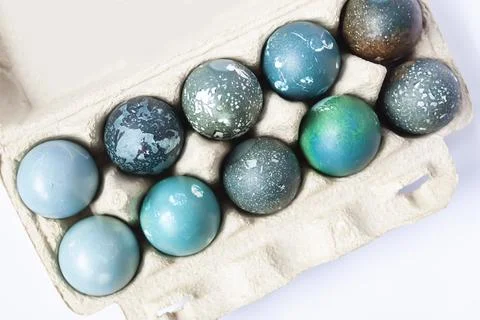 Colored Easter eggs in the paper box. Stock Photos
