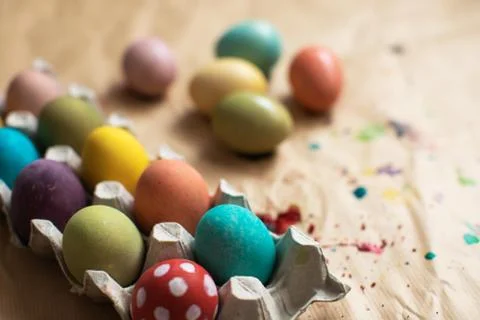 Colored easter eggs on table. Happy Easter! Stock Photos