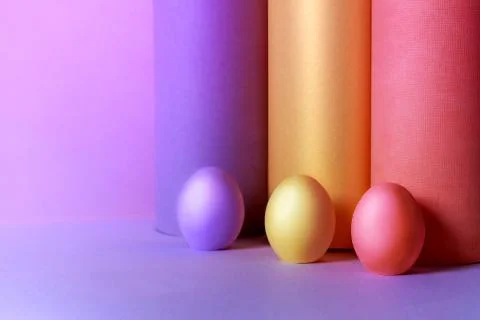 Colored Easter eggs with tubes made from craft paper. Ester concept Stock Photos