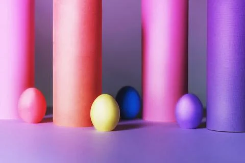 Colored Easter eggs with tubes made from craft paper. Ester concept Stock Photos