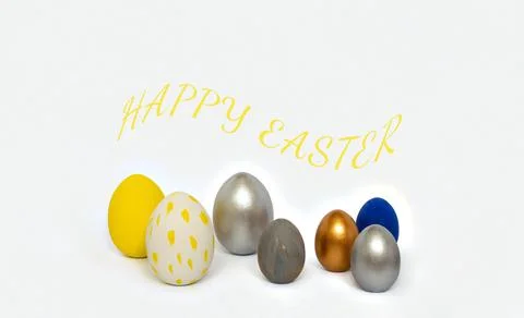 Colored easter eggs on white background with inscription Happy Easter. Congra Stock Photos