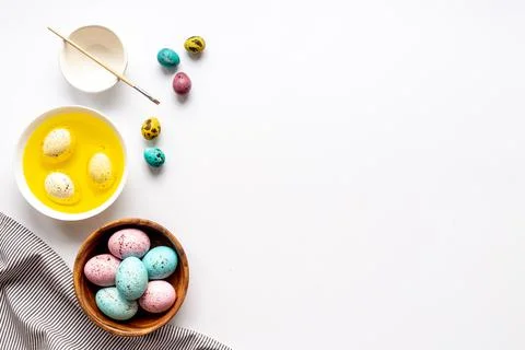 Colored Easter eggs with yellow dye. Top view Stock Photos