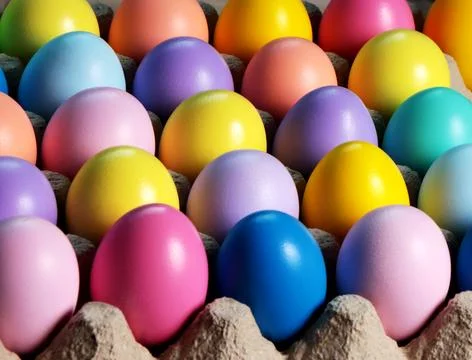 Colored egg boxes, colorful eggs for Easter. Stock Photos