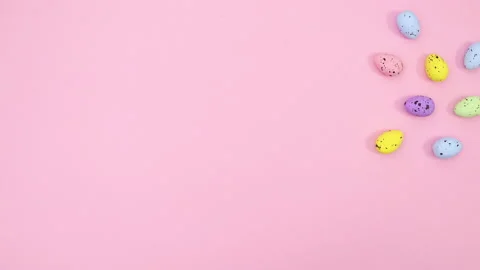 Colored eggs for easter appear on right side. Stop motion Stock-Footage 147741691