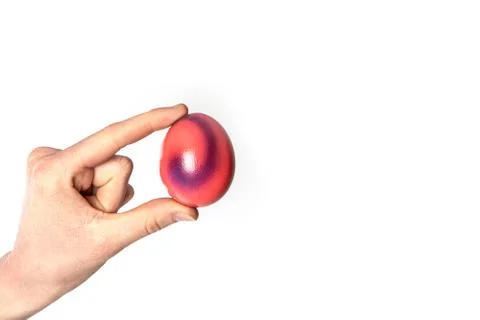 Colored eggs with hands tapping and crushing eggs Stock Photos