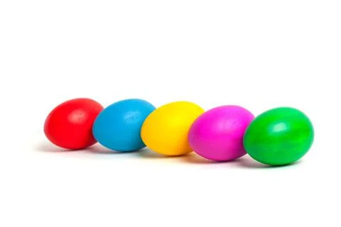 Colored eggs on a plate. Easter eggs. Stock Photos