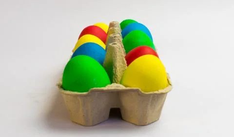 Colored eggs in a tray Easter is coming soon Stock Photos
