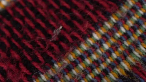Colored fabric macro. The camera shoots a plaid in the motion of a dolly. Vídeos de archivo 238869546