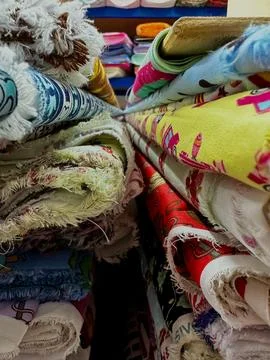 Colored fabric on rolls Stock Photos