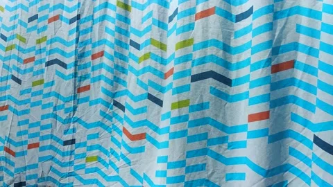Colored fabric with striped pattern swaying in the wind Stock Footage 160288057