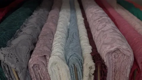 Colored fabrics in rolls on store shelves Stock Footage 169727552
