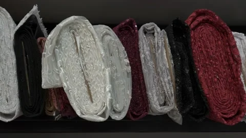 Colored fabrics in rolls on store shelves Stock-Footage 169727974