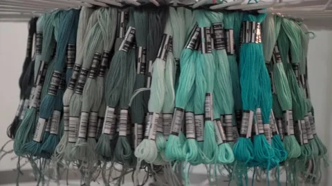 Colored fabrics in rolls on store shelves Stock Footage 169728199