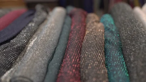 Colored fabrics in rolls on store shelves Stock Footage 169728560